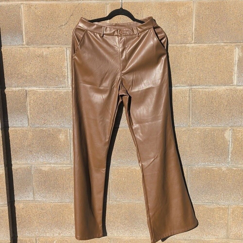 Leather like pants brown color, Medium Size. NWT